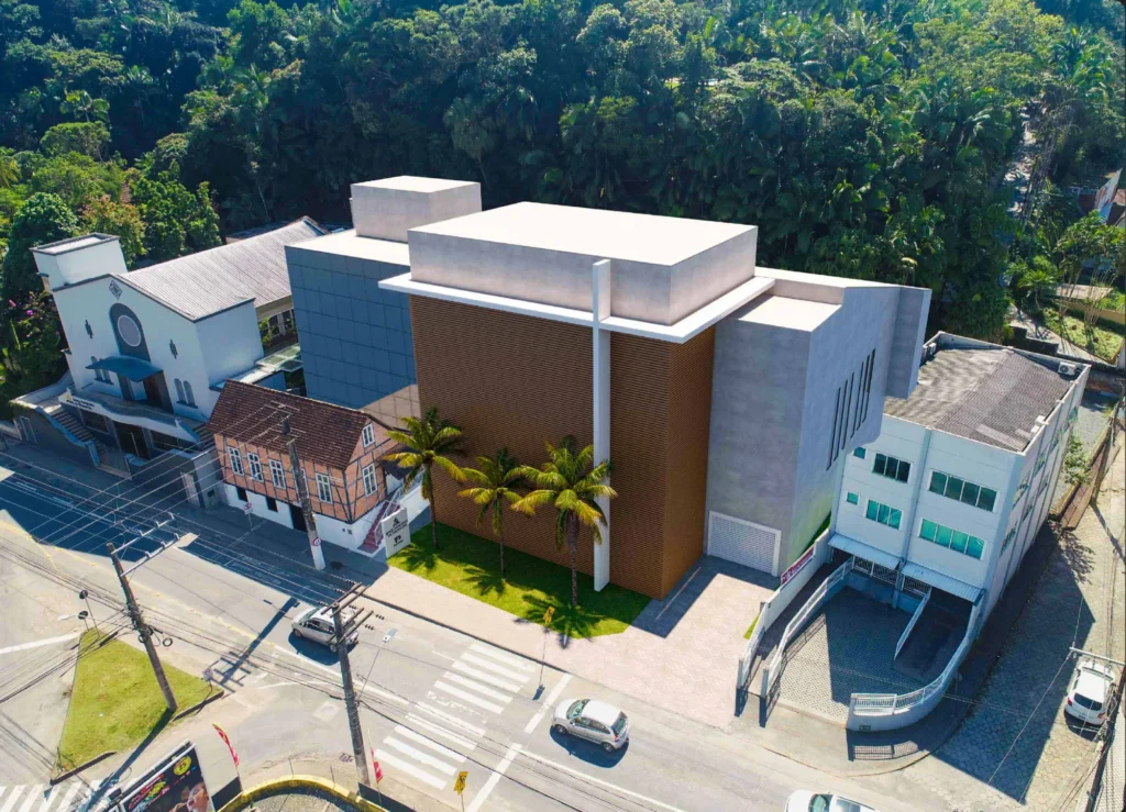 Simulação por computador do novo templo planejado ao lado da igreja atual
